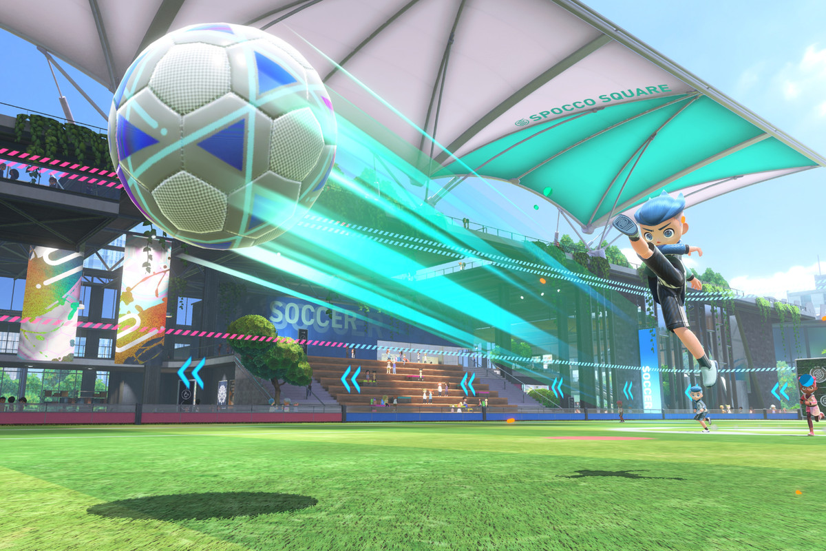 Screenshot from Nintendo Switch Sports soccer mini game in which a blue-haired boy kicks an oversized soccer ball