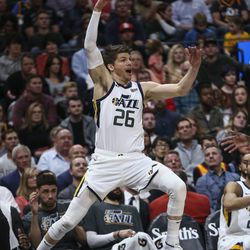 Utah Jazz guard Kyle Korver (26) tries to keep the ball from going out of bounds during their game against the Minnesota Timberwolves at Vivint Arena in Salt Lake City on Thursday, March 14, 2019.