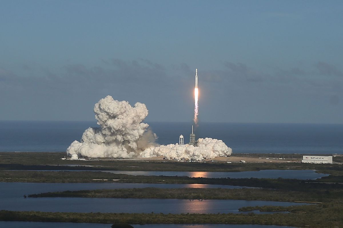The SpaceX Falcon Heavy rocket lifts off from launch pad 39A at Kennedy Space Center 