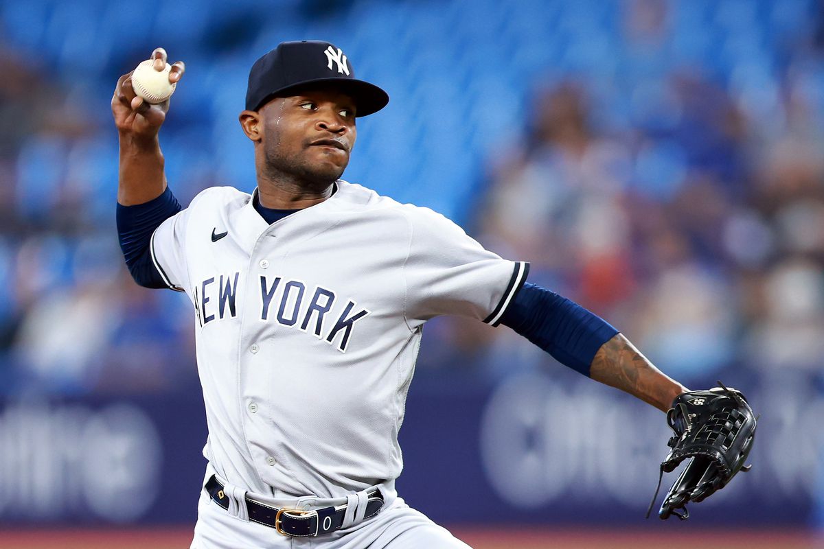 Domingo German #0 of the New York Yankees delivers a pitch in the first inning against the Toronto Blue Jays at Rogers Centre on May 16, 2023 in Toronto, Ontario, Canada.