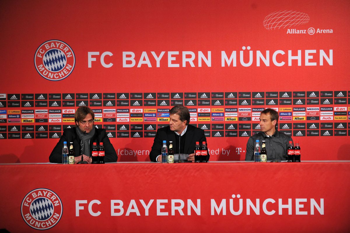 MUNICH, GERMANY - FEBRUARY 08: Jurgen Klopp, trainer of Dortmund and Jurgen Klinsmann, trainer of Bayern during the press conference after the Bundesliga match between FC Bayern Muenchen and Borussia Dortmund at the Allianz Arena on February 8, 2009 in Munich, Germany.