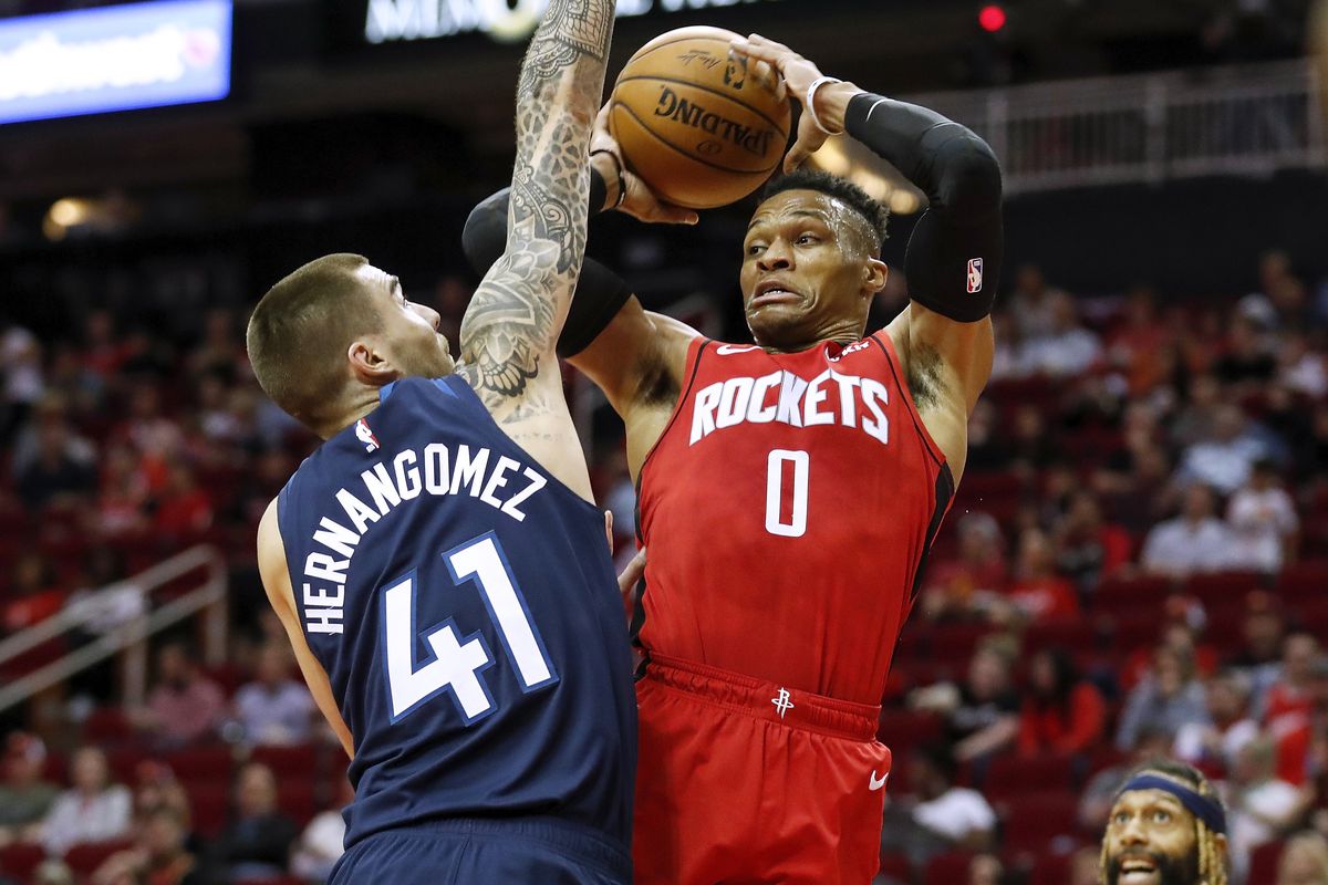 Russell Westbrook #0 of the Houston Rockets drives to the basket while defended by Juan Hernangomez #41 of the Minnesota Timberwolves in the first half at Toyota Center on March 10, 2020 in Houston, Texas.&nbsp;