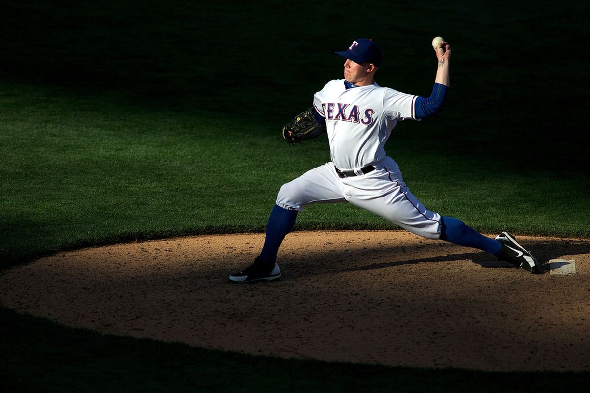 ARLINGTON, TX - MAY 26:  Robbie Ross #46 of the Texas Rangers pitches against the Toronto Blue Jays at Rangers Ballpark in Arlington on May 26, 2012 in Arlington, Texas.  (Photo by Cooper Neill/Getty Images)