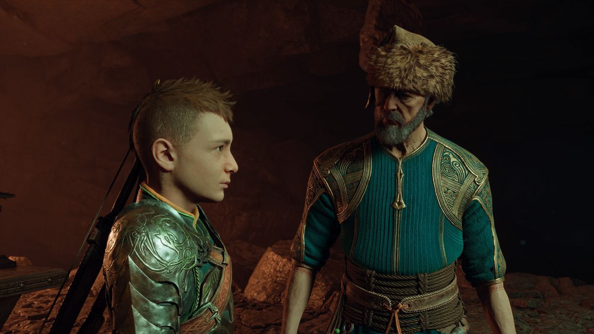 Atreus and Odin talk to one another in Odin’s underground study