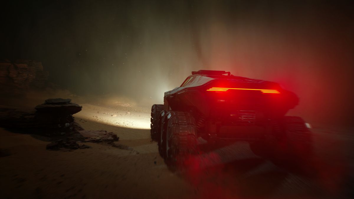 A tank-like vehicle drives through inclement weather on Mars in Fort Solis.