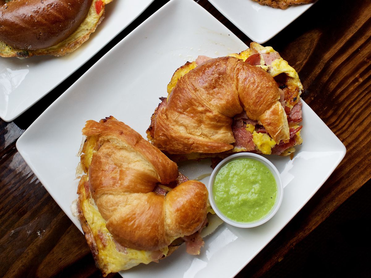Breakfast sandwiches and signature green hot sauce from Heat Da Spot in Park View