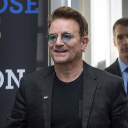 FILE - In this Sept. 17, 2016 file photo, Bono arrives at the Global Fund conference in Montreal. Bono will be honored as Glamour magazine's first Man of the Year among the magazine's Women of the Year recipients, on Nov. 14 in Los Angeles. 