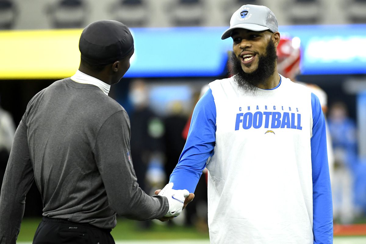 Josh Palmer #5 and Keenan Allen #13 of the Los Angeles Chargers shake hands before the game against the Kansas City Chiefs at SoFi Stadium on December 16, 2021 in Inglewood, California.