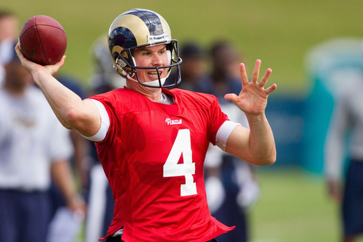 A.J. Feeley #4 of the St. Louis Rams passes during training camp at the Russell Athletic Training Facility. Feeley's the Rams starting QB...for now.