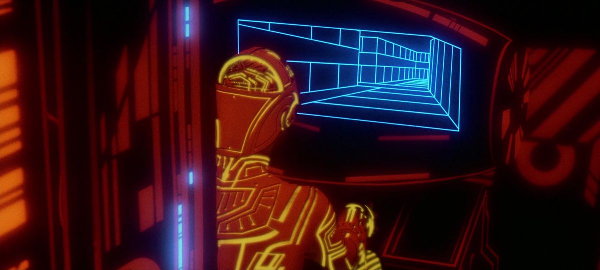 A program human lit up in red and yellow navigates a tank through blue-hued grid lines in Tron