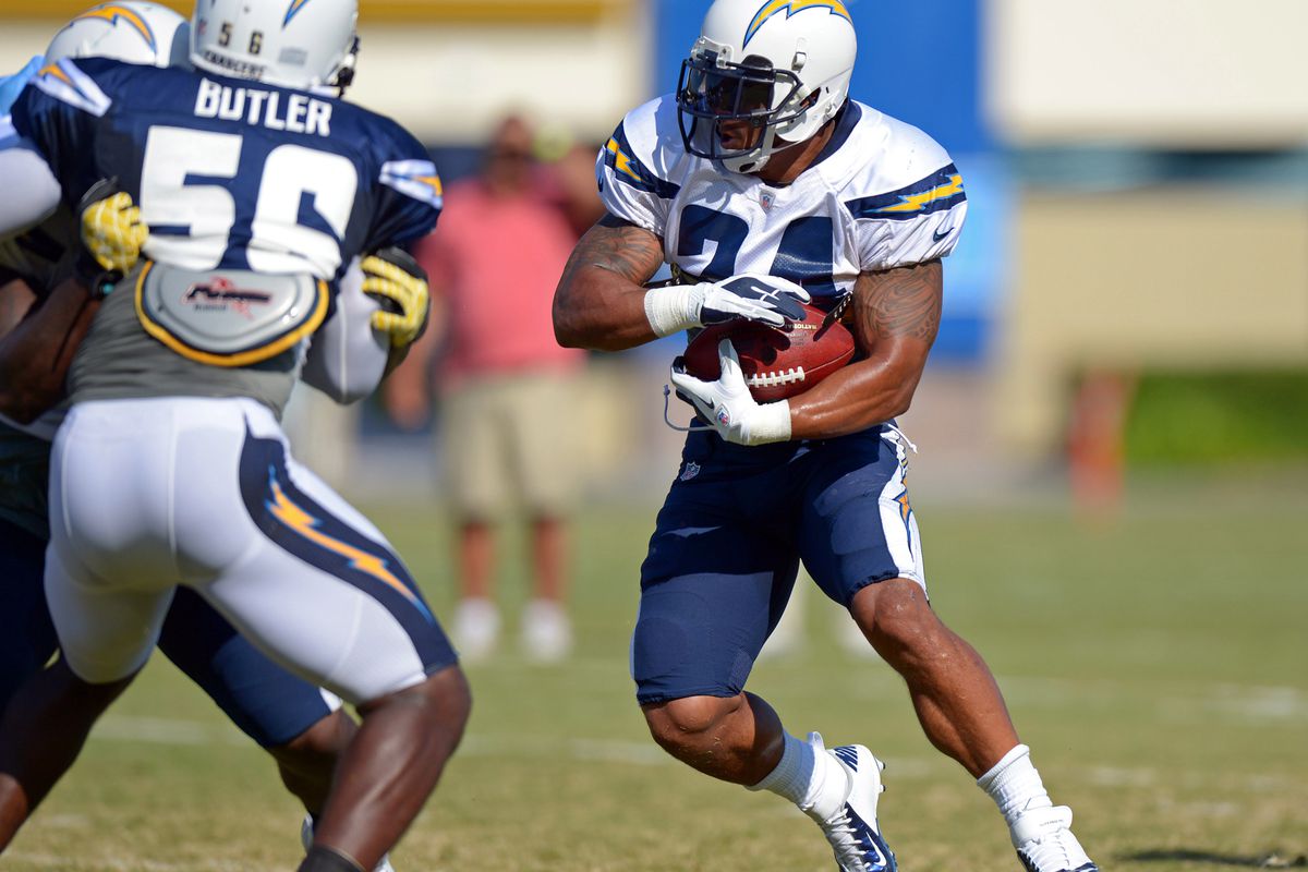 Aug 2, 2012; San Diego, CA, USA; San Diego Chargers running back Ryan Mathews (24) runs the ball as linebacker Donald Butler (56) gets blocked during training camp at Charger Park. Mandatory Credit: Jake Roth-US PRESSWIRE