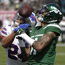 Buffalo Bills’ Taron Johnson (24) deflects a pass to New York Jets’ Robby Anderson (11) in the end zone during the first half of an NFL football game Sunday, Sept. 8, 2019, in East Rutherford, N.J.