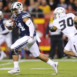 Brigham Young Cougars running back Algernon Brown (24) breaks into the secondary as BYU and Missouri play at Arrowhead Stadium in Kansas City Missouri Saturday, Nov. 14, 2015.