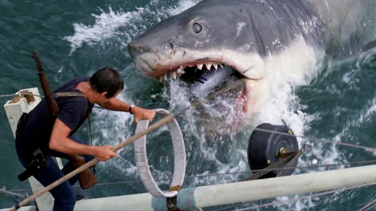 A super big-ass shark tries to eat Roy Scheider in Jaws.