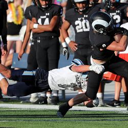 Salem Hills faces Highland in a high school football game played in Salt Lake City on Friday, Sept. 13, 2019.