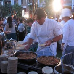 Chef John Besh preparing Show Cooked Molokai Shrimp and Andouille over Baked Jalapeno Cheese Grits