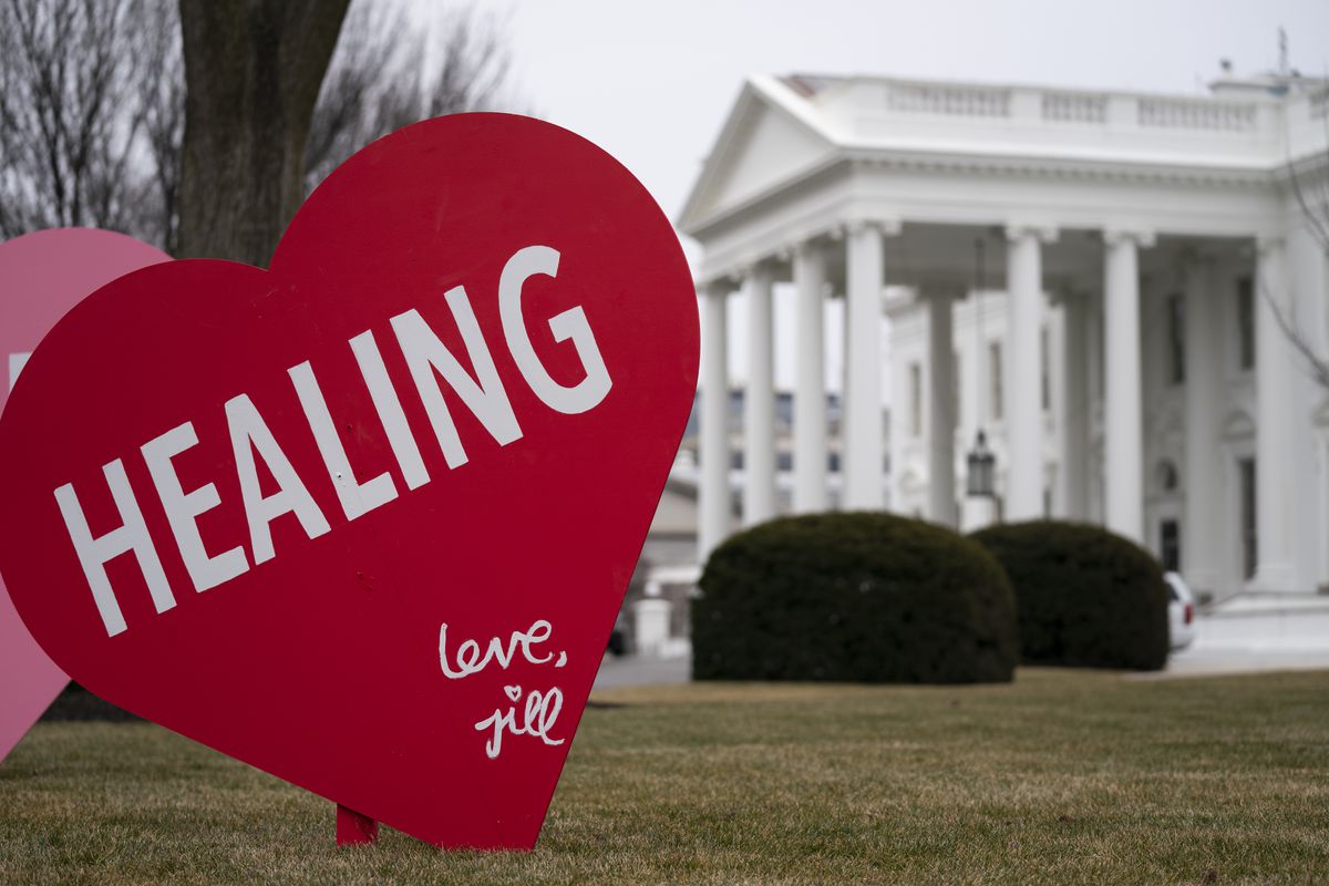 A Valentine’s Day decoration, signed by first lady Jill Biden, sits on the North Lawn of the White House, Friday, Feb. 12, 2021, in Washington.