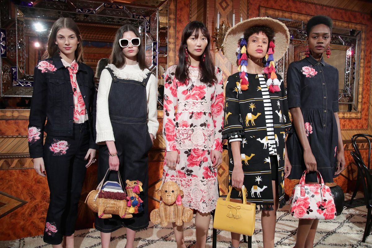 Models, standing in a row, wear quirky florals.