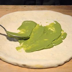 <strong>Vegetables</strong>: The green goddess of spring vegetables comes in twos on this pizza, and in two distinctly different presentations. Once the dough is pressed into shape, asparagus-garlic puree is spooned and swirled to create a not-too-thin-no