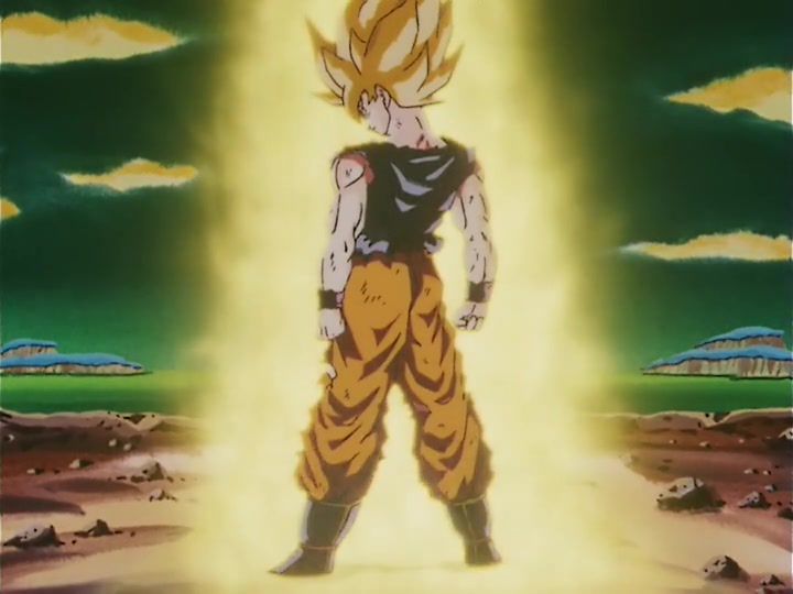 A blond-haired Goku surrounded by a glowing aura standing in a field under a green-colored sky in Dragon Ball Z.