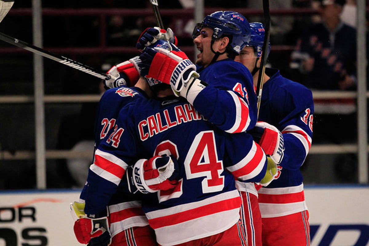 NEW YORK NY - FEBRUARY 17:  Ryan Callahan #24 of the New York Rangers is congratulated by his teammates for his goal in the second period against the Los Angeles Kings on February 17 2011 in New York City.  (Photo by Chris Trotman/Getty Images)