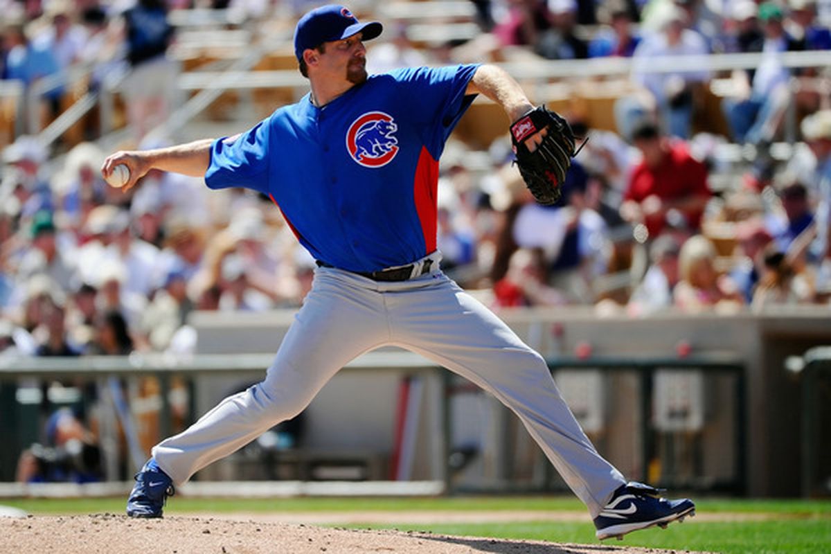 Ryan Dempster of the Chicago Cubs throws a pitch against the Chicago White Sox during a spring training baseball game at Camelback Ranch in Glendale, Arizona.  (Photo by Kevork Djansezian/Getty Images)
