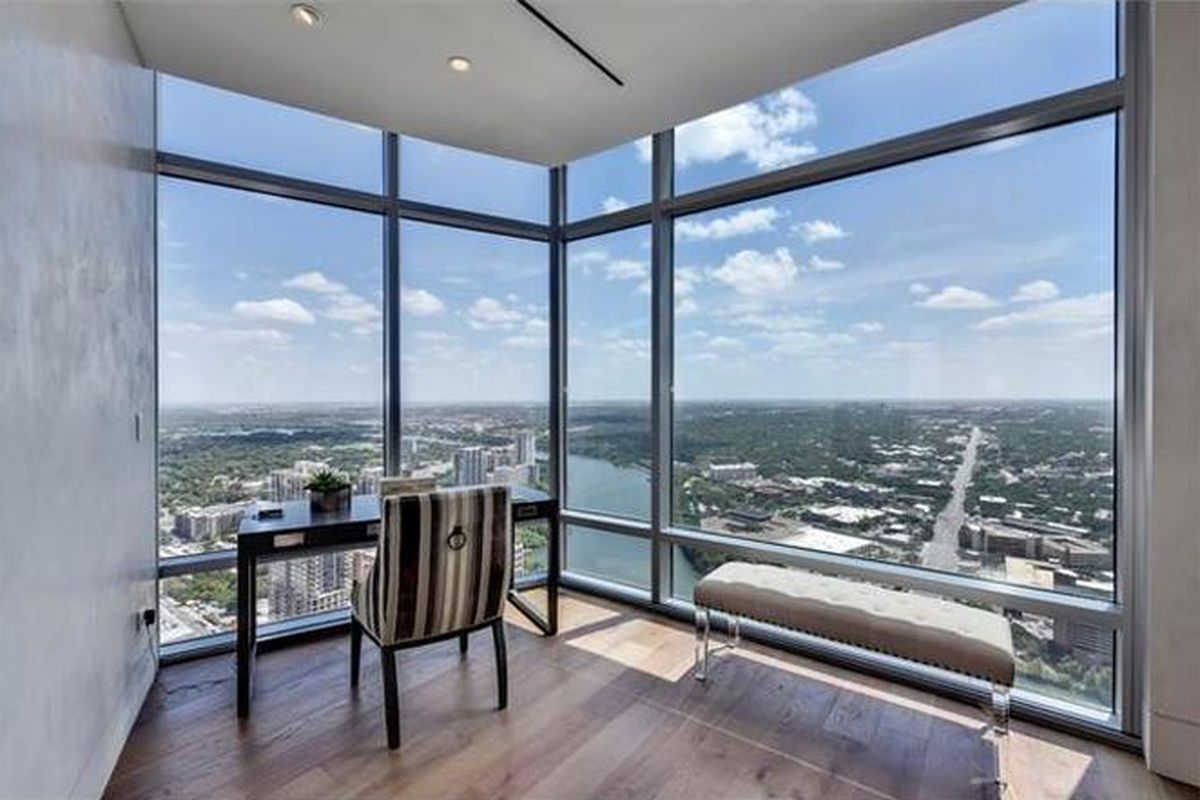 Corner of condo with views overlooking river and city