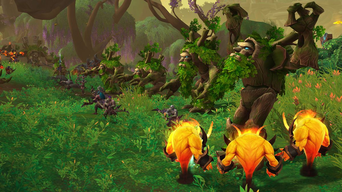 Fire elementals and treants do battle in the Emerald Dream, a mystical nature realm in World of Warcraft