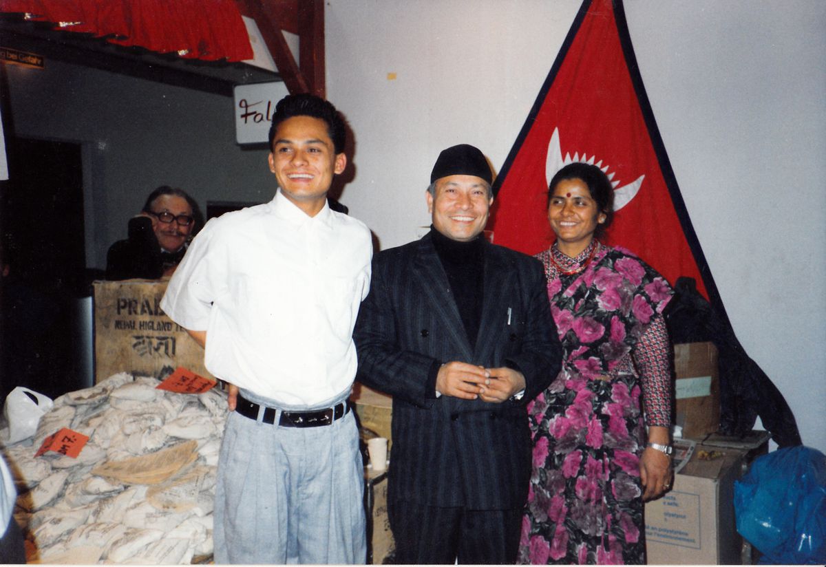 Swadesh Shrestha with his parents in their tea booth at an international trade fair in Berlin in the 1980s. | Provided