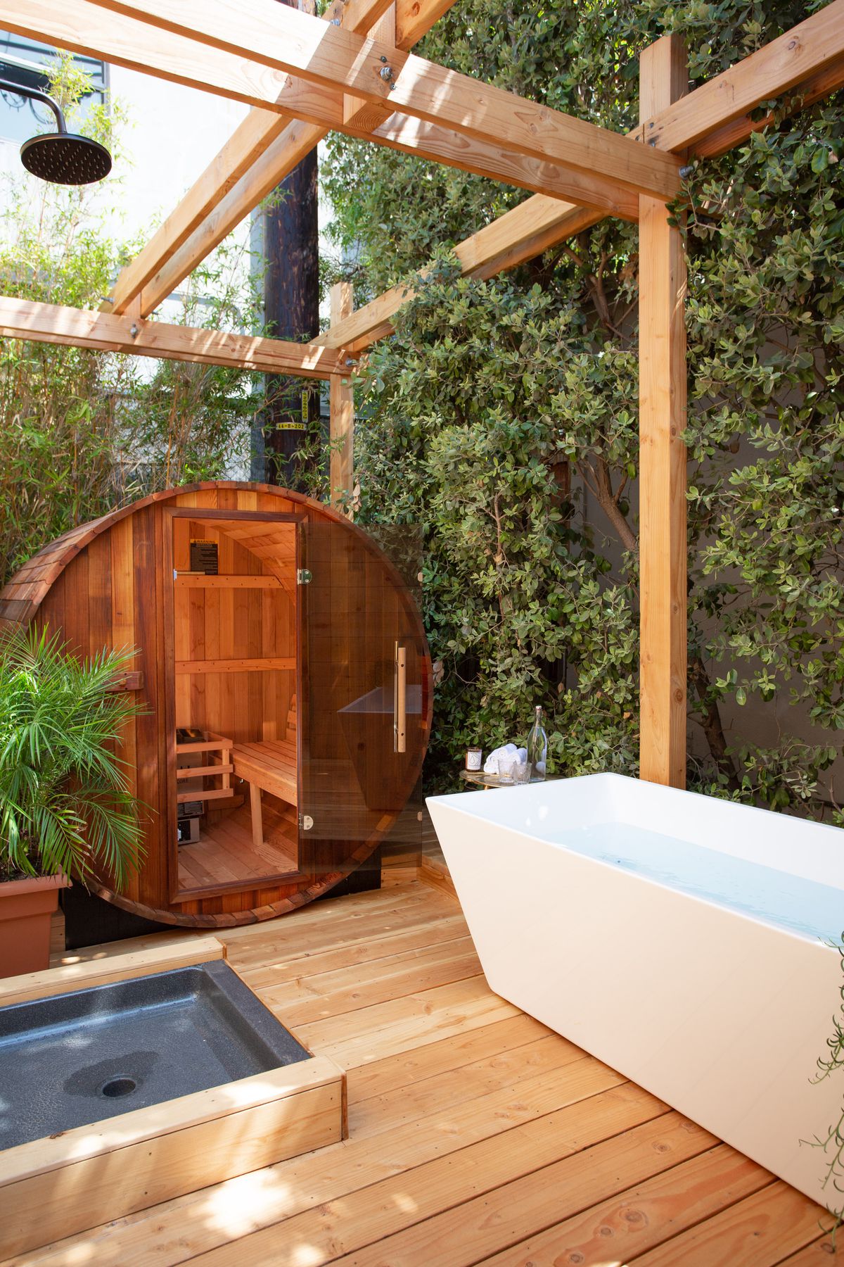A photo of a shower and a sauna.