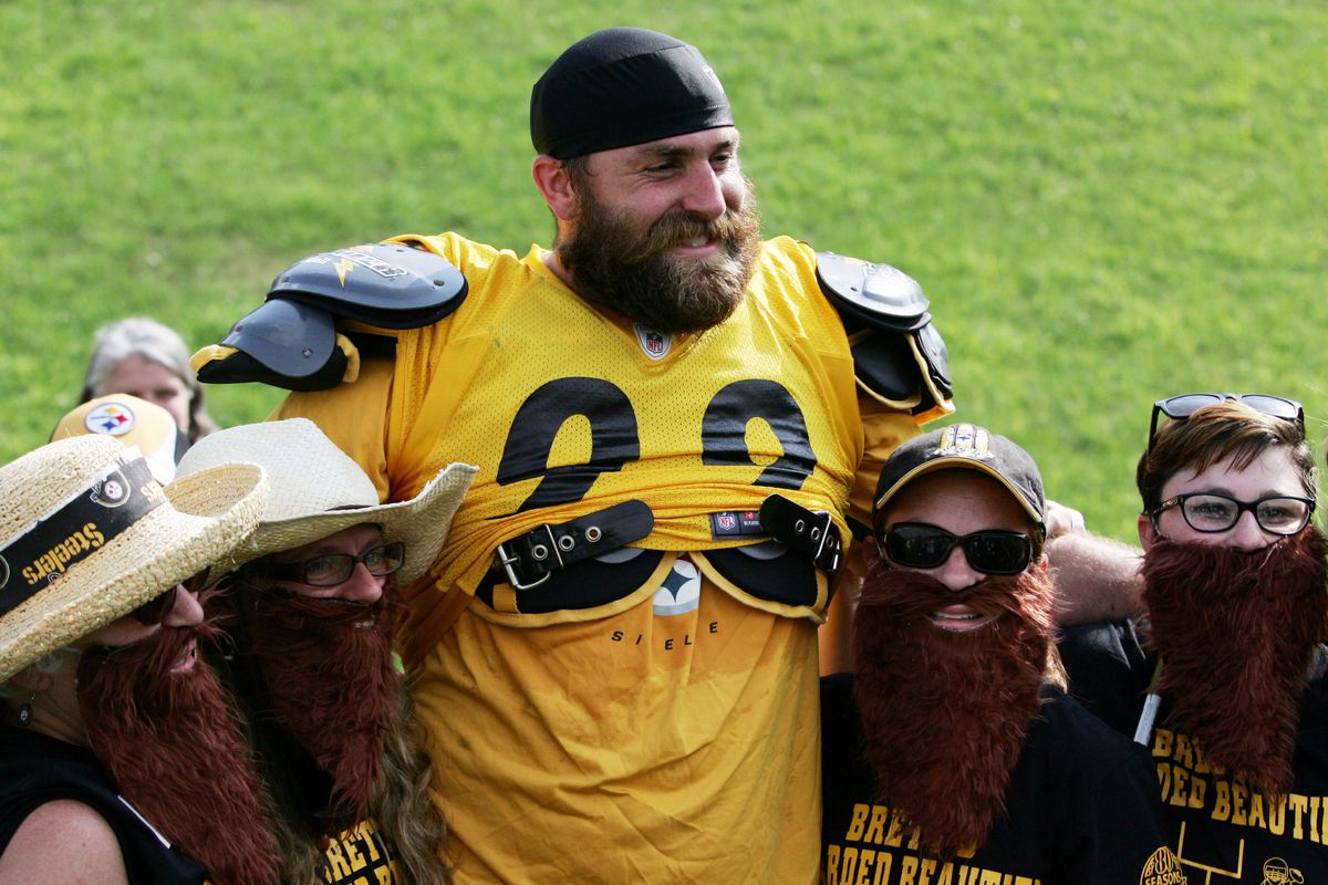 July 28, 2012; Pittsburgh, PA, USA; Pittsburgh Steelers defensive end Brett Keisel (99) greets fans on the field during training camp at Saint Vincent College. Mandatory Credit: Charles LeClaire-US PRESSWIRE