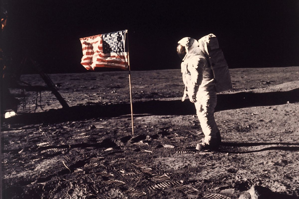 FILE - In this image provided by NASA, astronaut Buzz Aldrin poses for a photograph beside the U.S. flag deployed on the moon during the Apollo 11 mission on July 20, 1969. Television is marking the 50th anniversary of the July 20, 1969, moon landing with