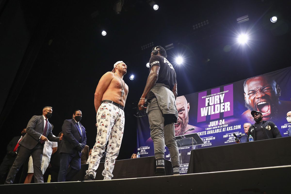 Tyson Fury and Deontay Wilder face off during the press conference at The Novo by Microsoft at L.A. Live on June 15, 2021 in Los Angeles, California.