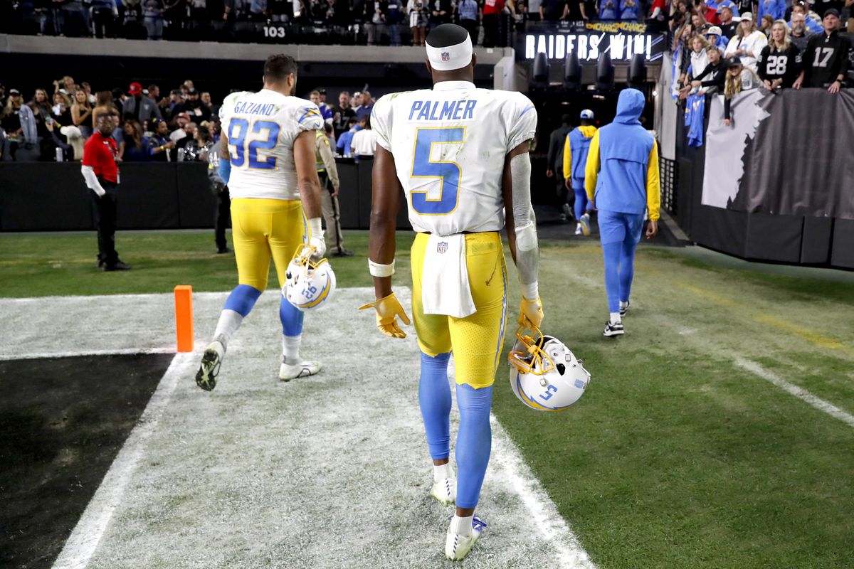 Joshua Palmer #5 of the Los Angeles Chargers leaves the field after losing to the Las Vegas Raiders 27-20 at Allegiant Stadium on December 04, 2022 in Las Vegas, Nevada.