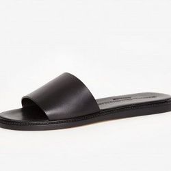 <b>Woman by Common Projects</b> Slide Sandal, <a href="http://www.thedreslyn.com/common-projects-slide-sandal.html">$390</a>