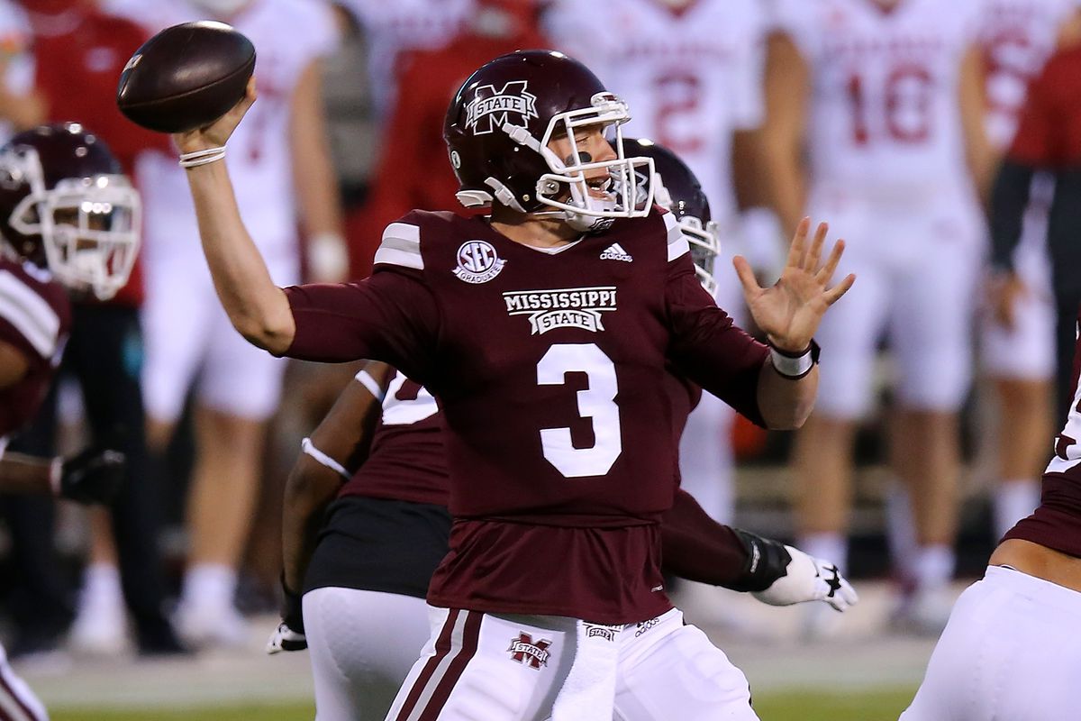 K.J. Costello of the Mississippi State Bulldogs throws the ball against the Arkansas Razorbacks during the first half at Davis Wade Stadium on October 03, 2020 in Starkville, Mississippi.