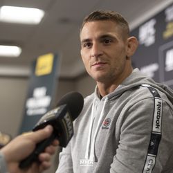 Dustin Poirier answers questions at UFC 236 media day.