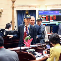 Utah World War II veterans are honored for their service in the Senate at the Capitol in Salt Lake City on Wednesday, Feb. 18, 2015.