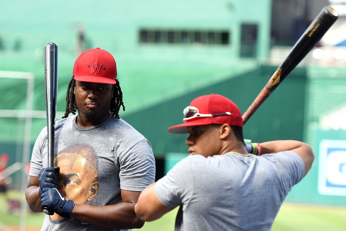 &nbsp;Josh Bell #19 and Juan Soto #22 of the Washington Nationals attend batting practice prior to a baseball game against the New York Mets at Nationals Park on August 1, 2022 in Washington, DC.