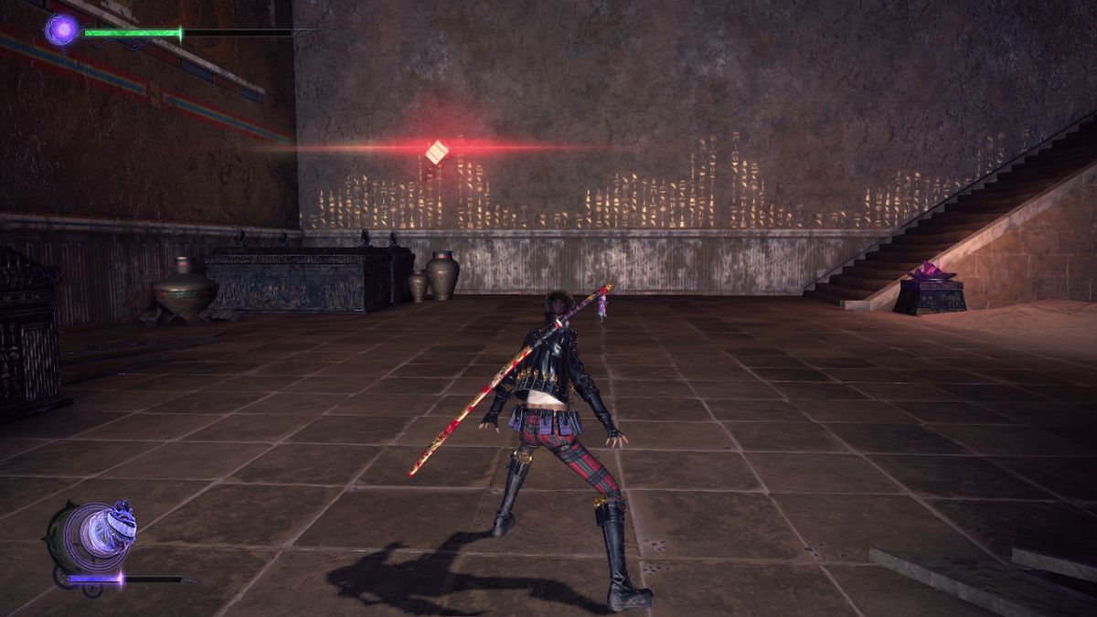 Viola stands inside a dark temple in Bayonetta 3.