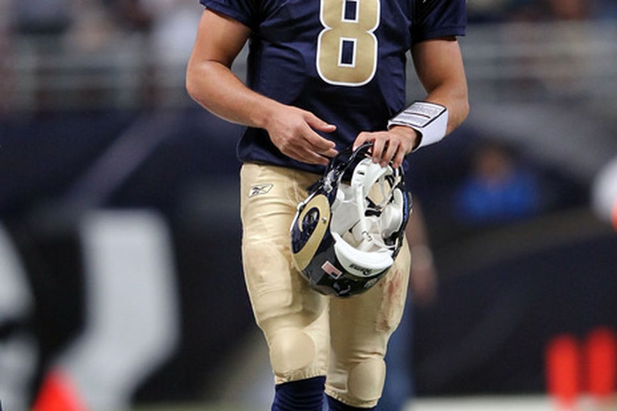 Quarterback Sam Bradford #8 of the St. Louis Rams walks off the field during the game against the Baltimore Ravens on September 25, 2011 at the Edward Jones Dome in St Louis, Missouri.  (Photo by Jamie Squire/Getty Images)