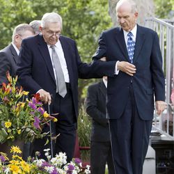 President Boyd K. Packer of the Quorum of the Twelve Apostles  is helped by Elder Russell M. Nelson at the groundbreaking for the Brigham City Temple in Brigham City, Utah, on Saturday, July 31, 2010. President Packer later dedicated that temple near his home.