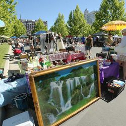 Shoppers browse during the 3rd annual Urban Flea Market in Salt Lake City Sunday, June 9, 2013.