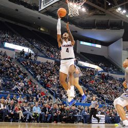 UConn's Jalen Adams (4) during the Monmouth Hawks vs UConn Huskies men's college basketball game at the XL Center in Hartford, CT on December 2, 2017.