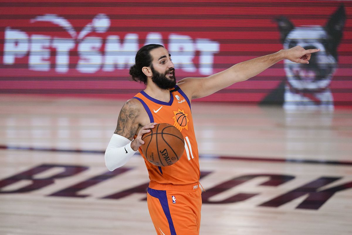 Phoenix Suns guard Ricky Rubio motions to teammates during the second half of an NBA basketball game against the Dallas Mavericks, Sunday, Aug. 2, 2020, in Lake Buena Vista, Fla.&nbsp;