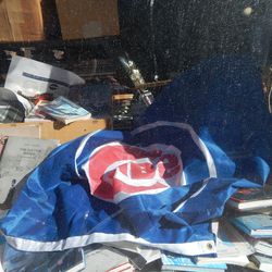 Through a dirty junk store window