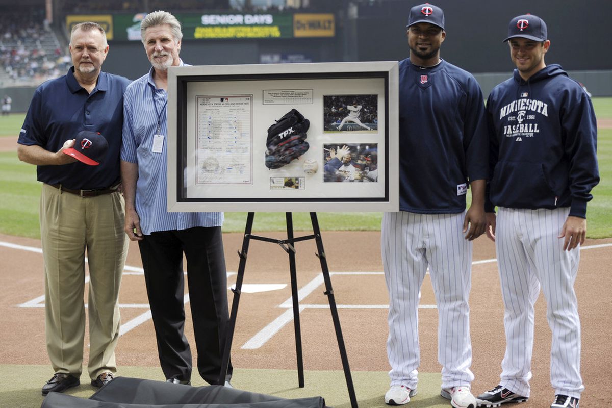 MINNEAPOLIS, MN - Former pitchers Bert Blyleven (L) and Jack Morris of the Minnesota Twins present Francisco Liriano #47 and catcher Drew Butera #41 of the Minnesota Twins with a plaque for Liriano's no hitter. (Photo by Hannah Foslien/Getty Images)