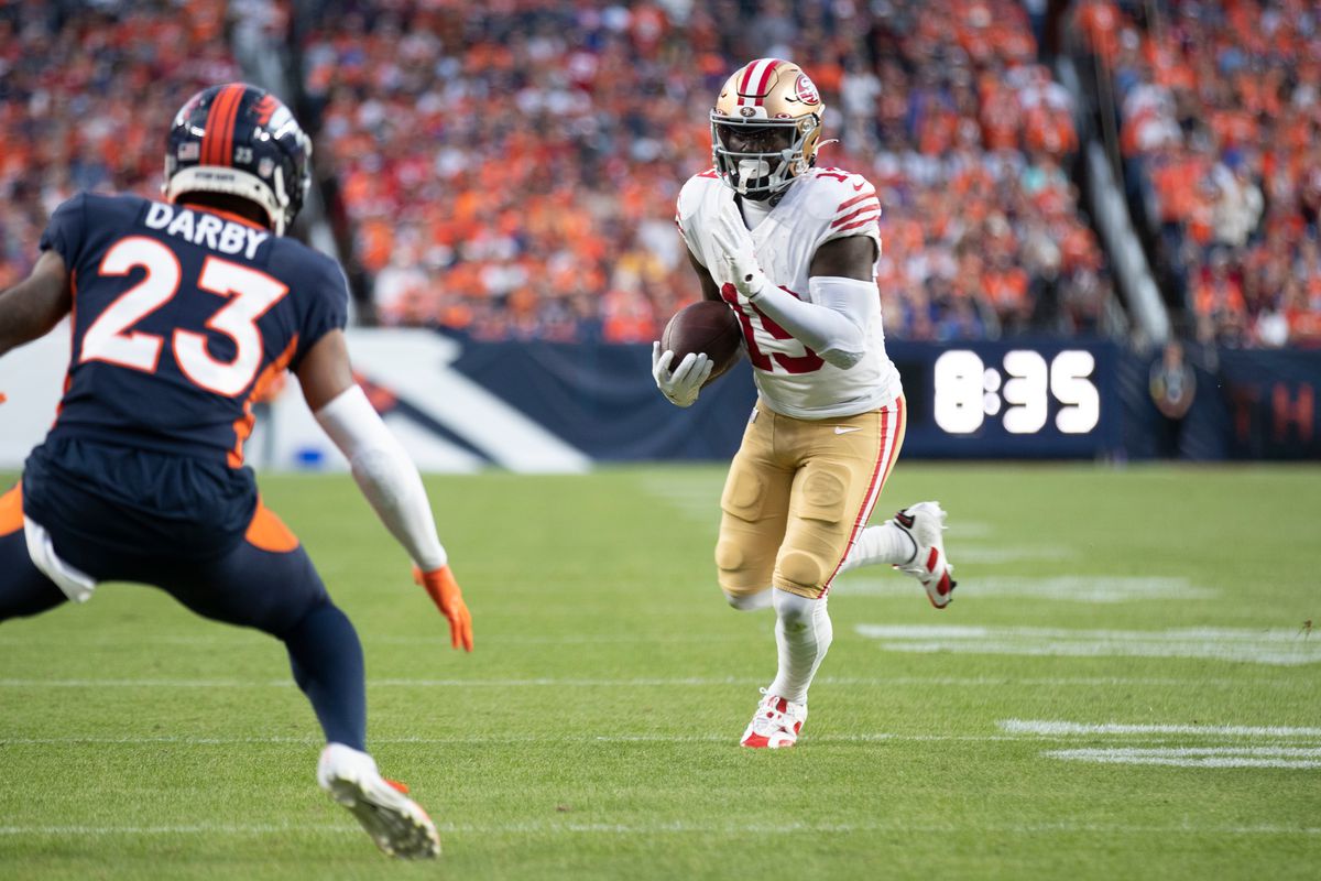 Deebo Samuel #19 of the San Francisco 49ers rushes during the game against the Denver Broncos at Empower Field At Mile High on September 25, 2022 in Denver, Colorado. The Broncos defeated the 49ers 11-10.