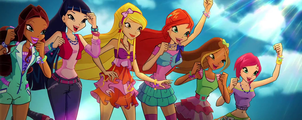 the girls of winx club jumping against a blue sky