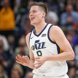 Utah Jazz forward Jonas Jerebko (8) celebrates after sinking a three during the game against the Golden State Warriors at Vivint Arena in Salt Lake City on Tuesday, April 10, 2018.